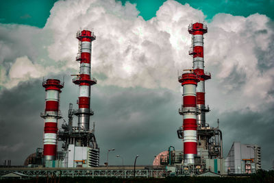 Low angle view of factory against sky