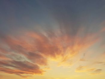 Low angle view of dramatic sky during sunset