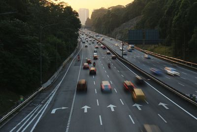 Blurred motion of vehicles on road in city