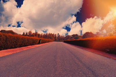 Road amidst landscape against sky