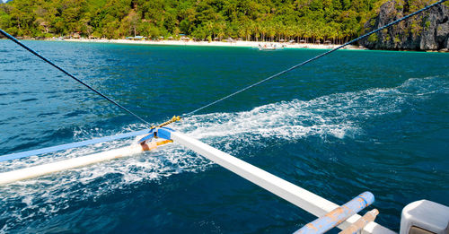 High angle view of man surfing in sea