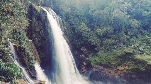 Close-up of waterfall against sky