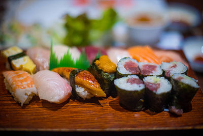 Close-up of sushi served on table