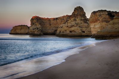 Scenic view of rock formation at praia da marinha