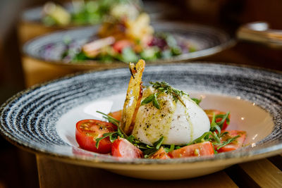 Close-up of mozzarella di bufala served in plate