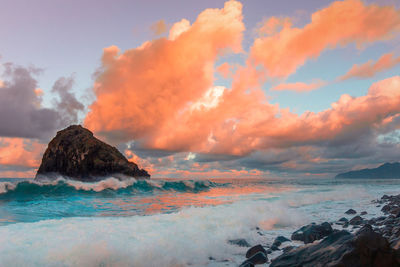 Scenic view of sea against sky during sunset