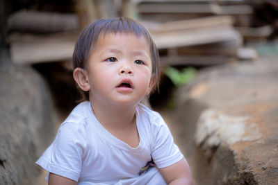 Portrait of cute boy looking away