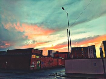 City against sky during sunset