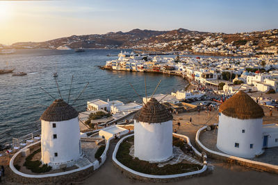 High angle view of townscape by sea