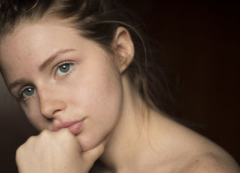 Close-up portrait of young woman