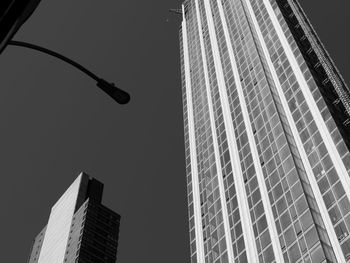 Low angle view of modern buildings against clear sky