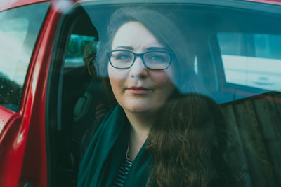 Portrait of woman in car