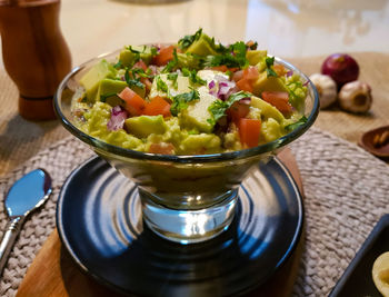 High angle view of guacamole in bowl on table