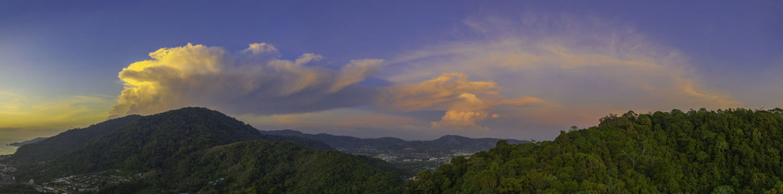 Panoramic view of landscape against sky during sunset