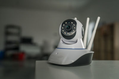 Close-up of telephone on table