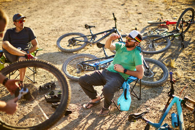 Mountain bikers enjoying post ride beers.