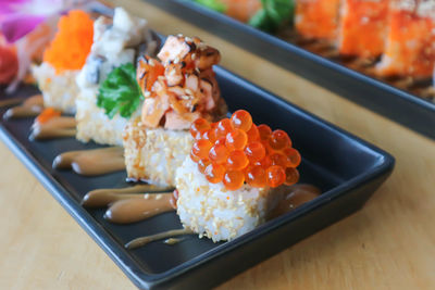 Close-up of sushi served on table