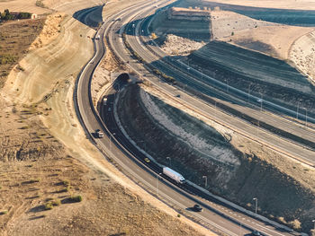 High angle view of road passing through land