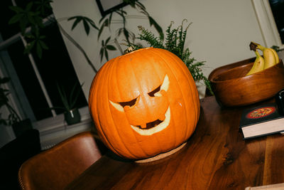 Close-up of jack o lantern on table