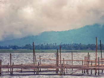 Scenic view of sea against cloudy sky