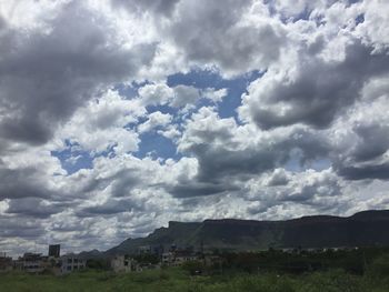 Scenic view of residential buildings against sky