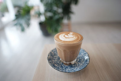 Coffee cup on table