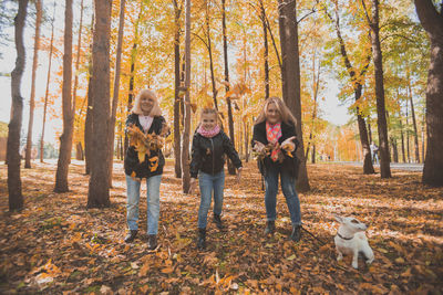 Group of people in forest during autumn