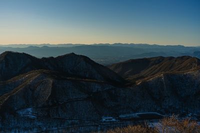 Scenic view of mountains against sky during sunset