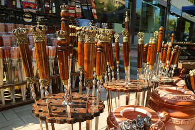 Close-up of swords for sale at market