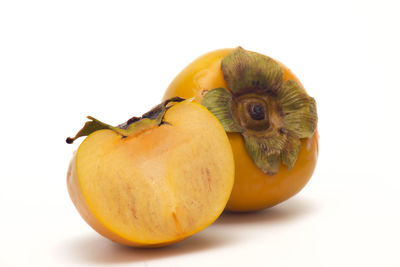 Close-up of apple against white background