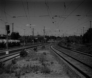 Train on railroad tracks against sky