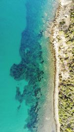 High angle view of surf on beach