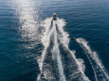 High angle view of people on sea