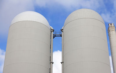 Two high silos with animal feed