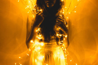 Blurred motion of woman at night