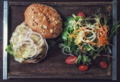 High angle view of fruits and vegetables on cutting board