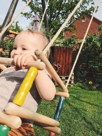 Baby girl playing in yard