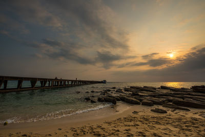 Scenic view of sea at sunset