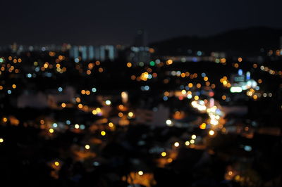 High angle view of illuminated city at night