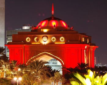 Low angle view of illuminated building at night