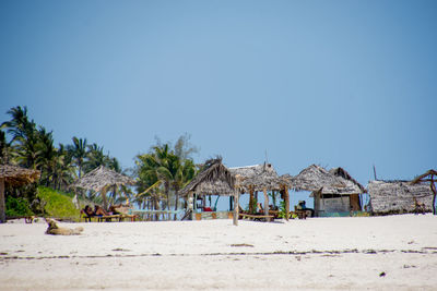 Panoramic view of beach against clear sky