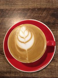 High angle view of cappuccino on table