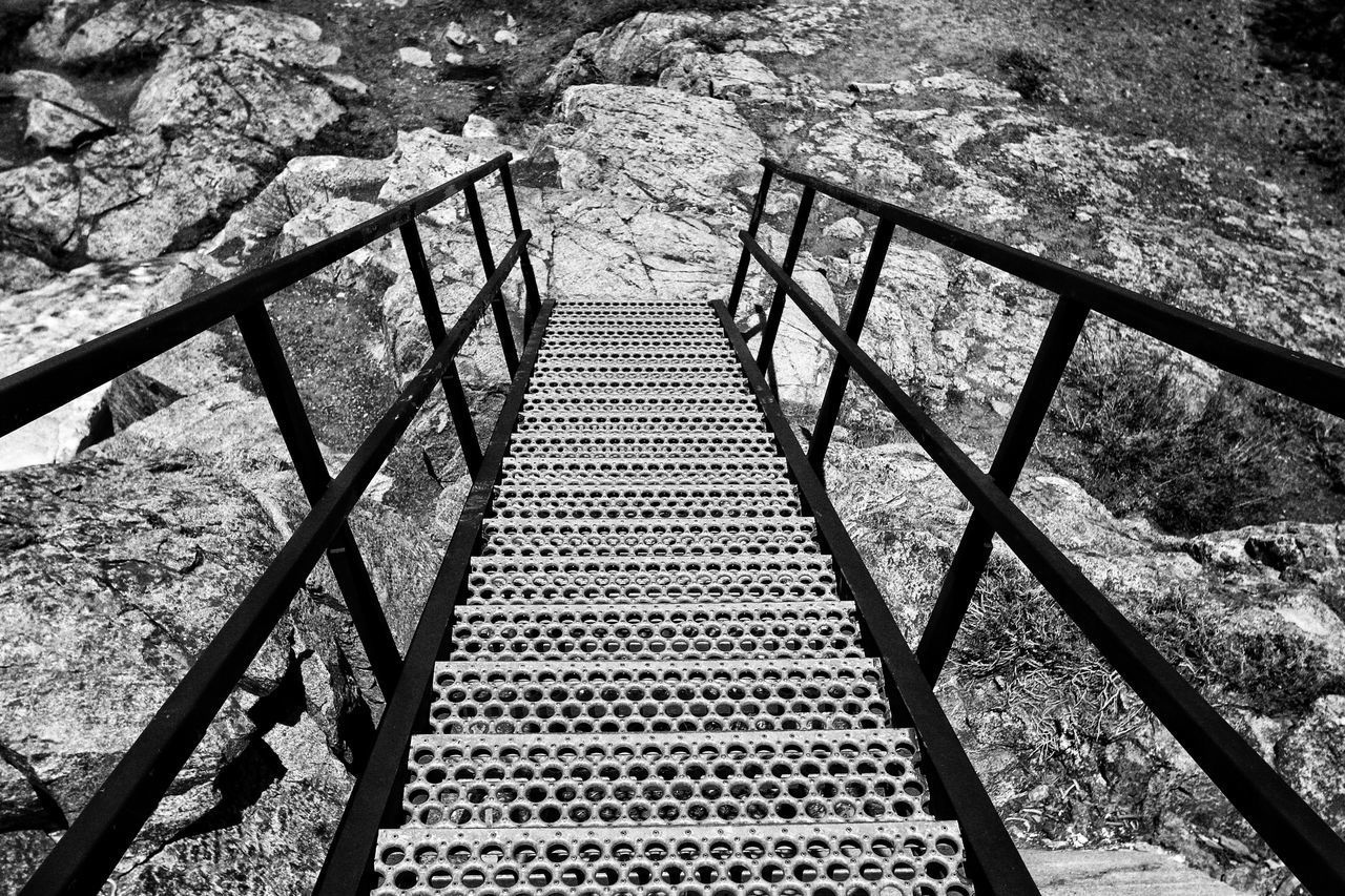 HIGH ANGLE VIEW OF STEPS AND RAILING