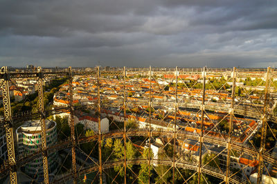 High angle view of buildings in city against sky