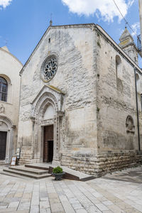 Exterior of historic building against sky