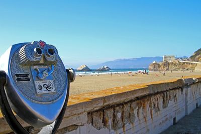 Panoramic view of sea against clear blue sky