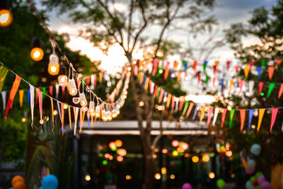 Defocused image of illuminated christmas lights at night