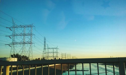 Electricity pylon at sunset