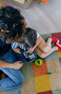 High angle view of woman photographing