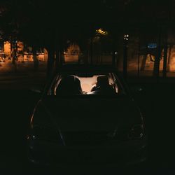 View of illuminated street light at night